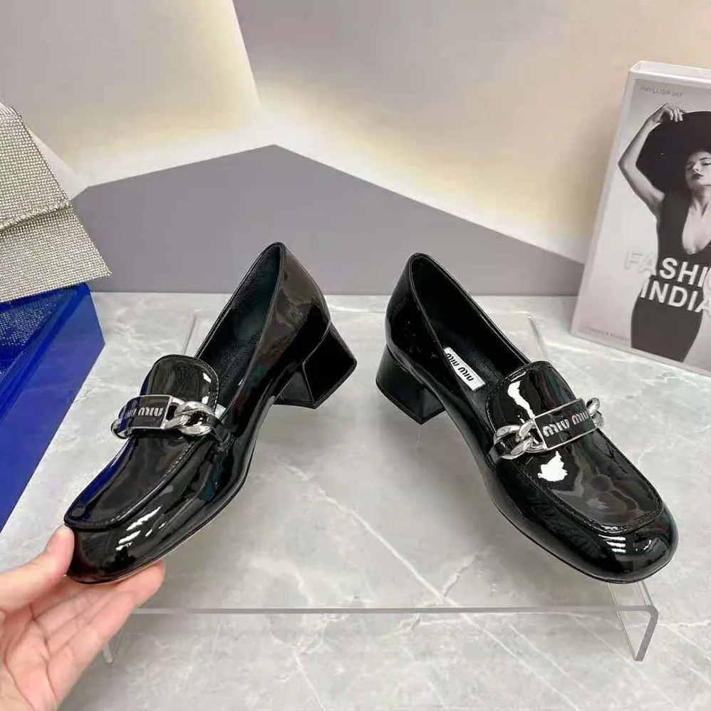 Miu Miu Patent Leather Loafers in 35 mm Heel Height for Women in Black