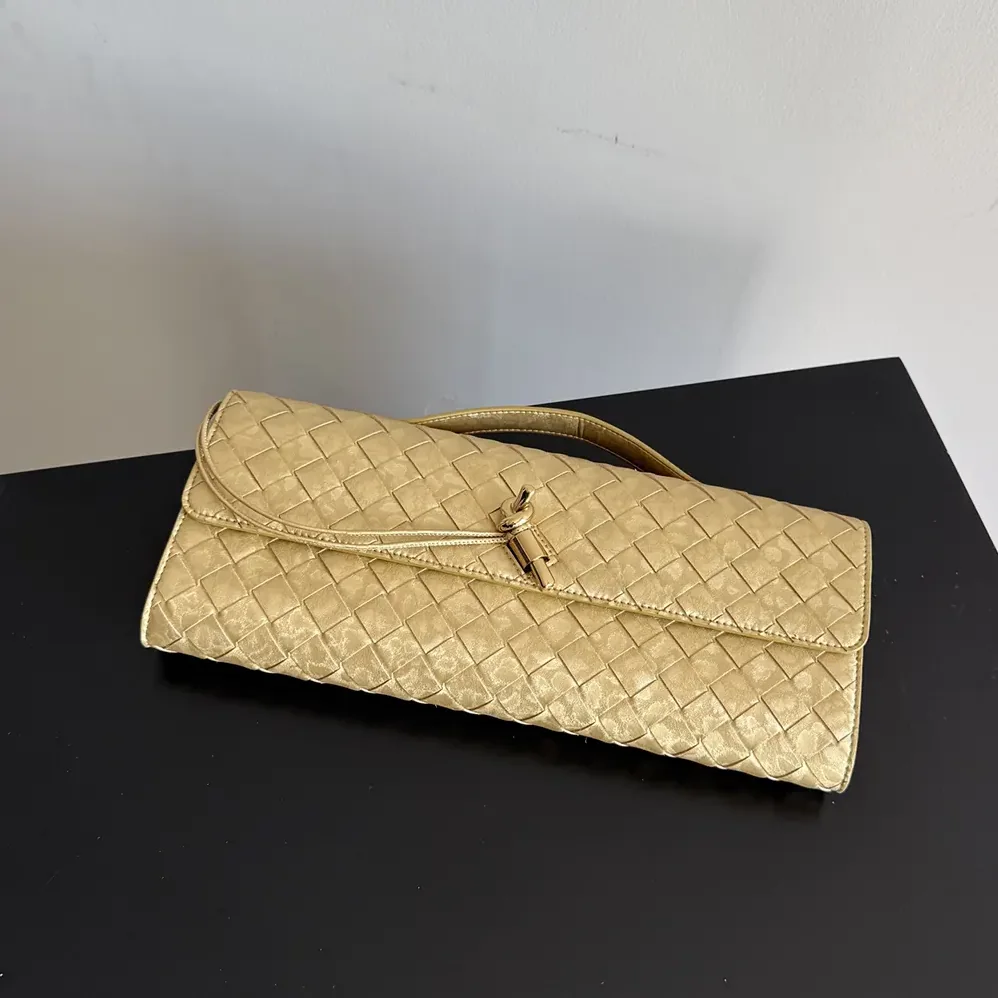 Bottega Veneta Andiamo Clutch for Women in Gold Bottega Veneta Andiamo Clutch for Women in Gold