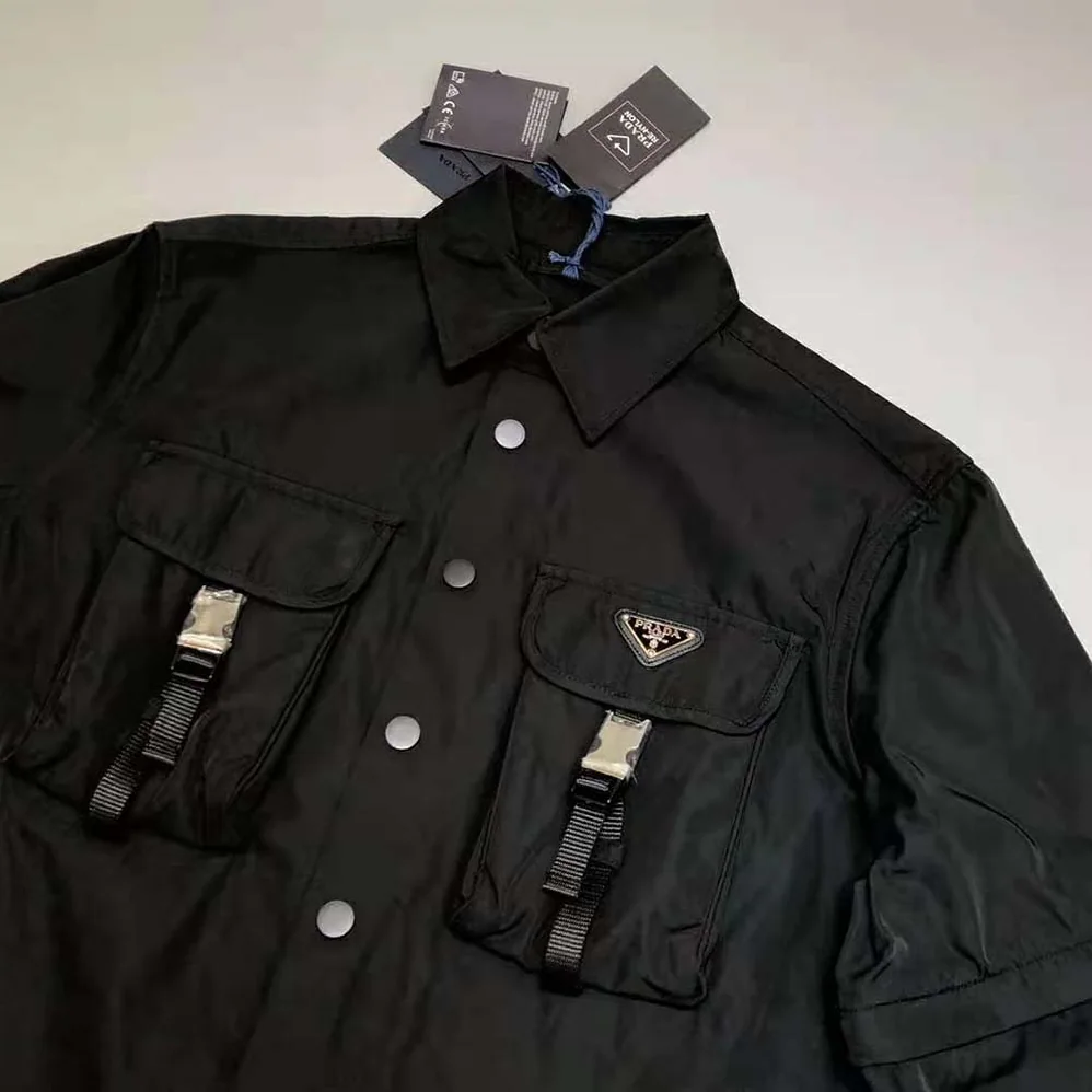Prada Defined by an Oversized Fit and Large Patch Pocket with Strap Re for Women in Nylon Shirt