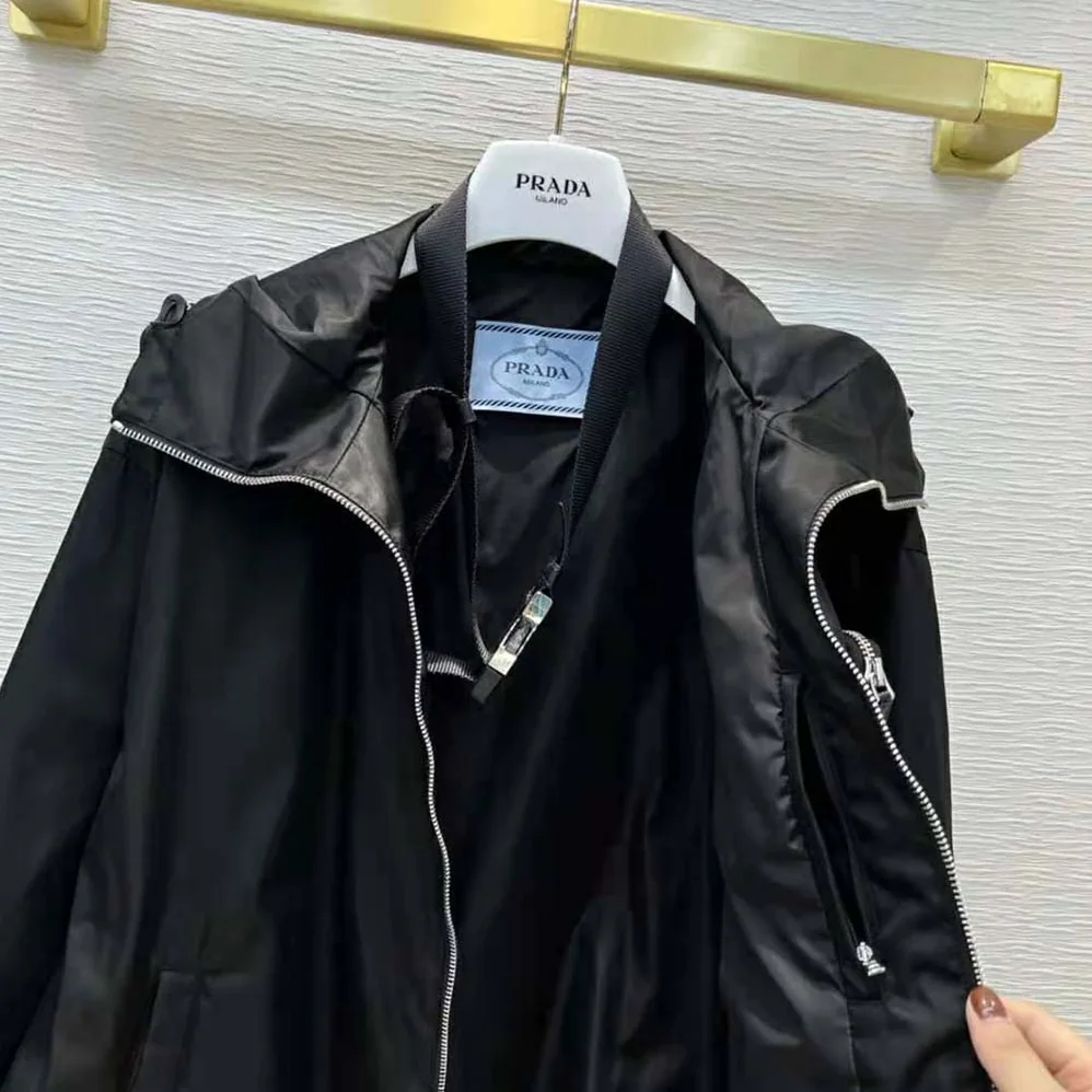 Prada Re-Nylon Hooded Blouson Jacket with Pouch for Women in Black Prada Re-Nylon Hooded Blouson Jacket with Pouch for Women in Black