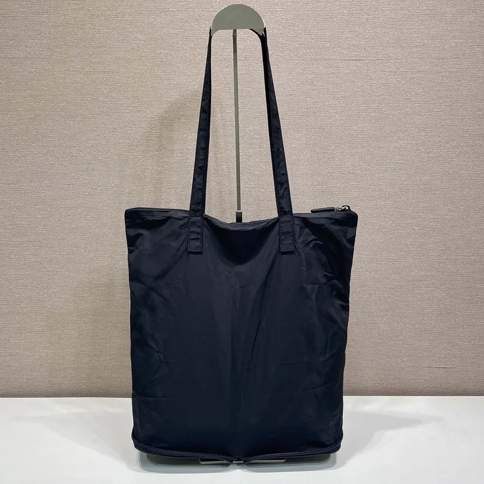 Prada Saffiano Leather Pendant With Re-Nylon Tote Bag for Women in Black Prada Saffiano Leather Pendant With Re-Nylon Tote Bag for Women in Black