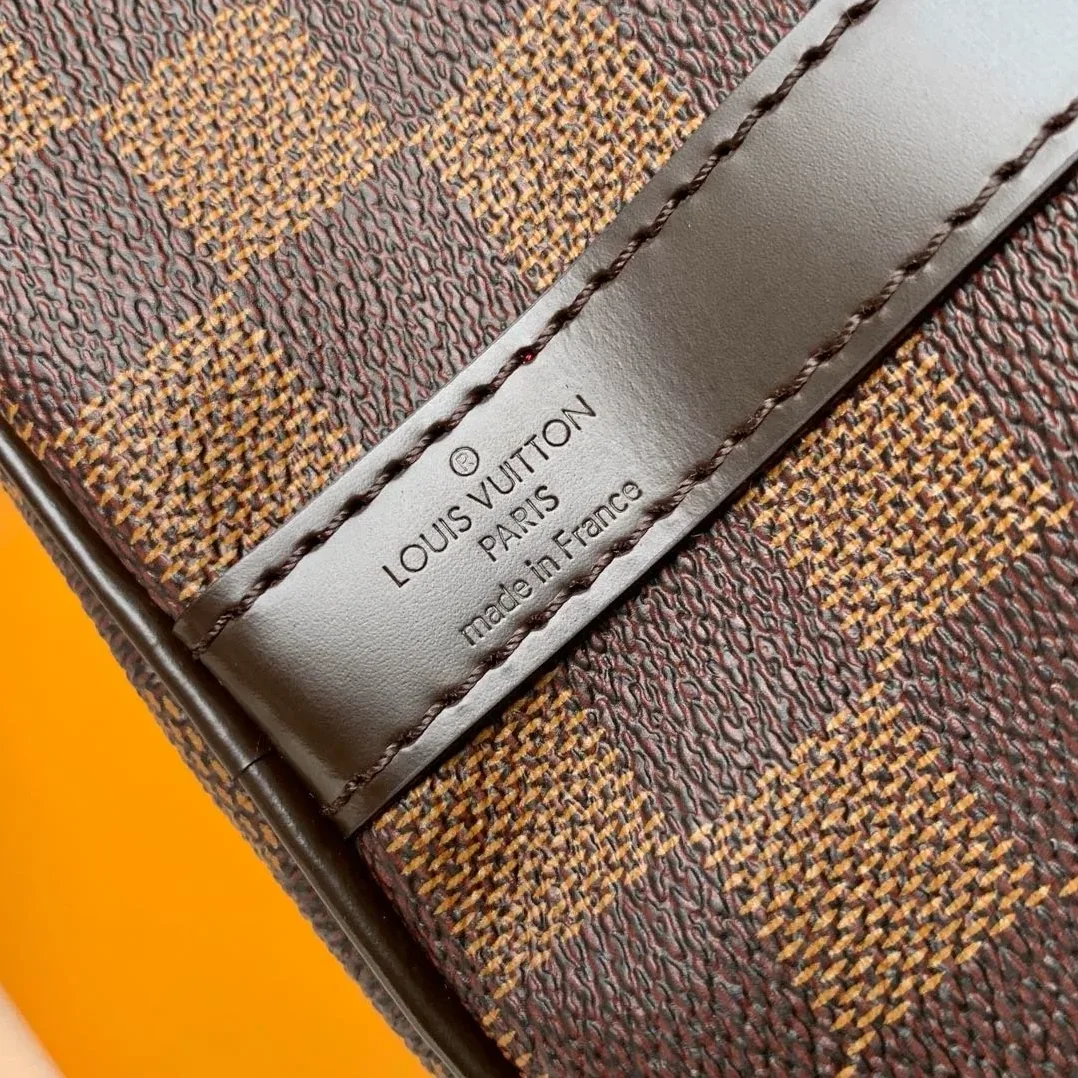 Louis Vuitton Speedy Bandouliere 25 Top Handle Bag in Brown Gold Hardware