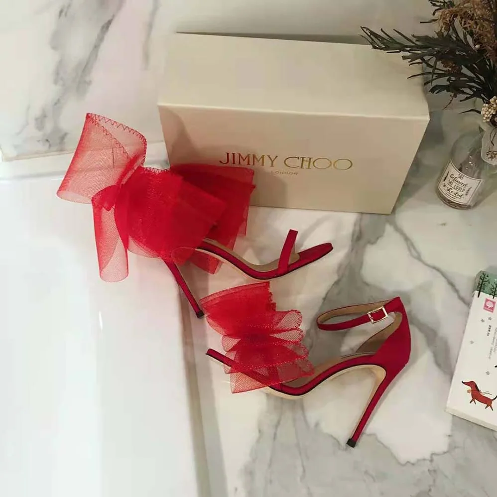 Jimmy Choo Aveline 100 Red Sandals with Asymmetric Grosgrain Mesh Fascinator Bows for Women Jimmy Choo Aveline 100 Red Sandals with Asymmetric Grosgrain Mesh Fascinator Bows for Women