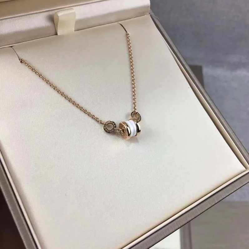 Bvlgari B.zero1 Soft Bracelet in 18 KT Rose Gold with 18 KT Rose Gold and White Ceramic Pendant for Women