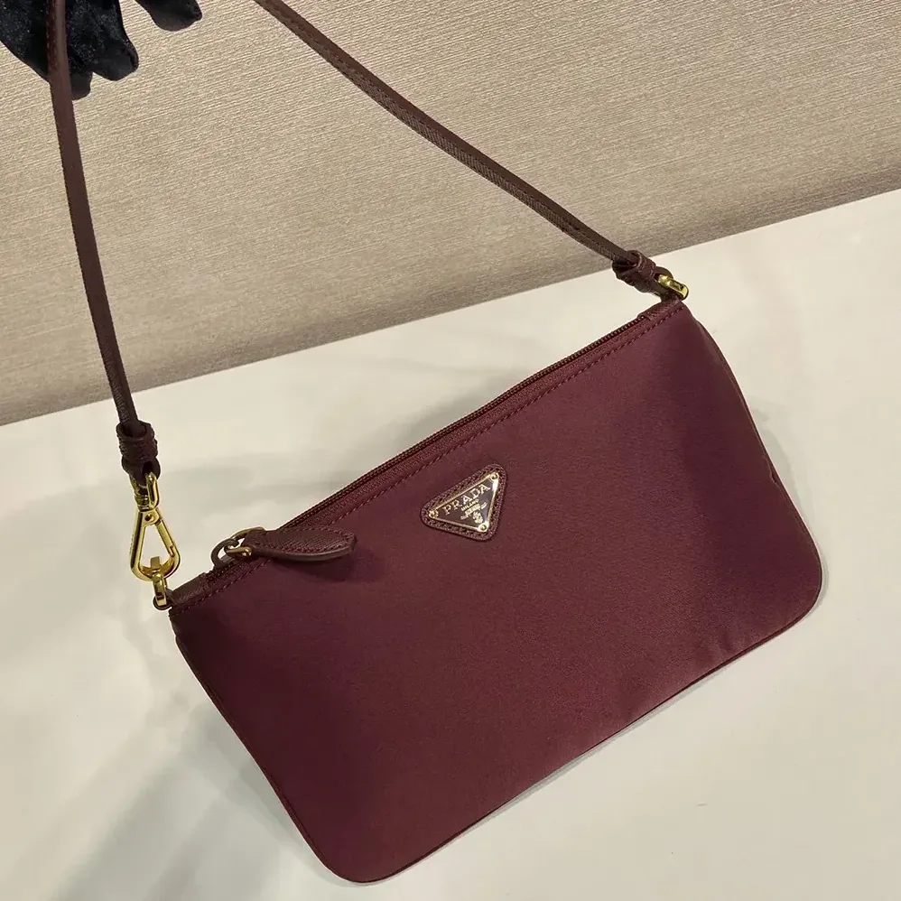 Prada Re-Nylon Pouch Enameled Metal Triangle Logo for Women Prada Re-Nylon Pouch Enameled Metal Triangle Logo for Women
