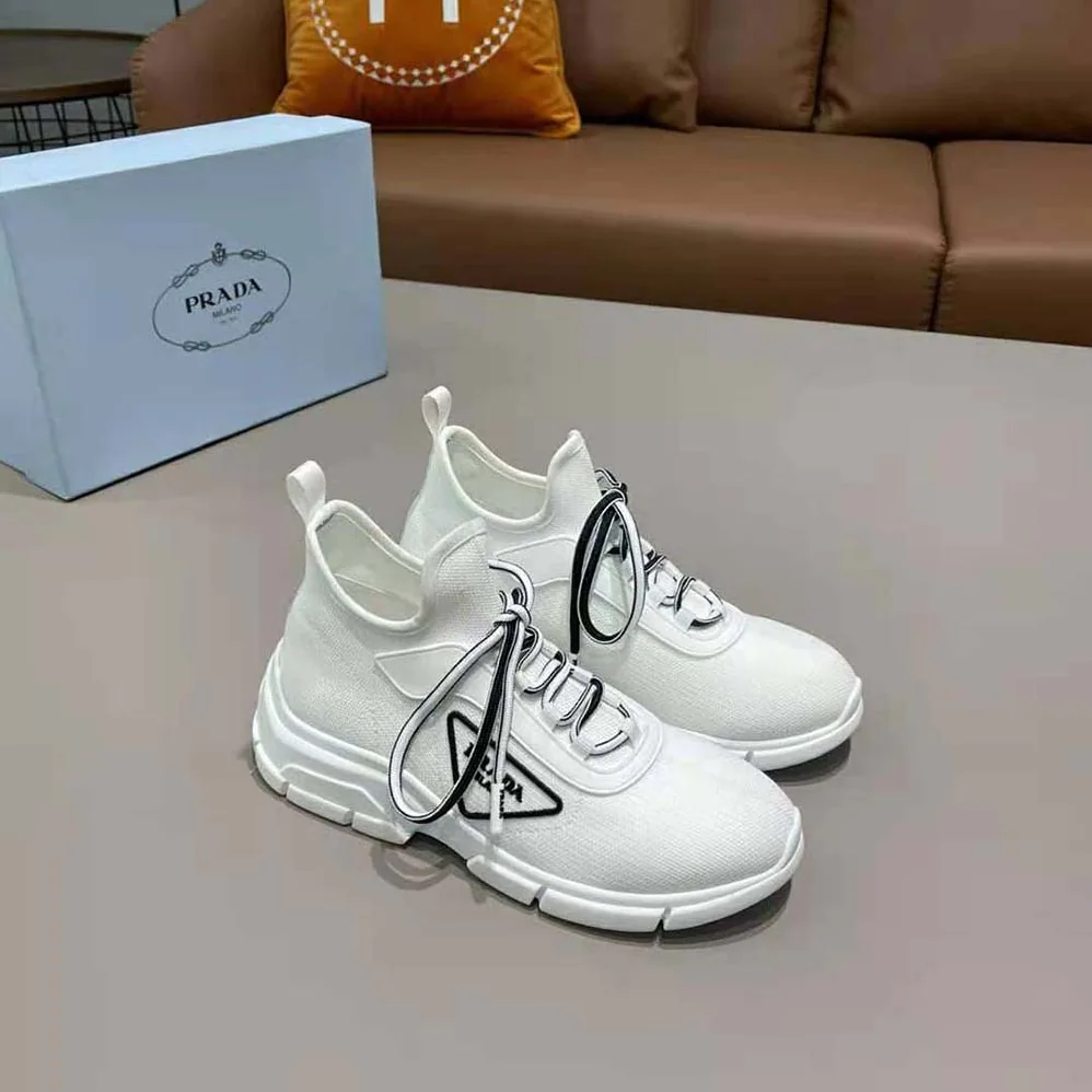 Prada The Triangle Logo Decorates These Knit Fabric Sneakers for Women in White Prada The Triangle Logo Decorates These Knit Fabric Sneakers for Women in White
