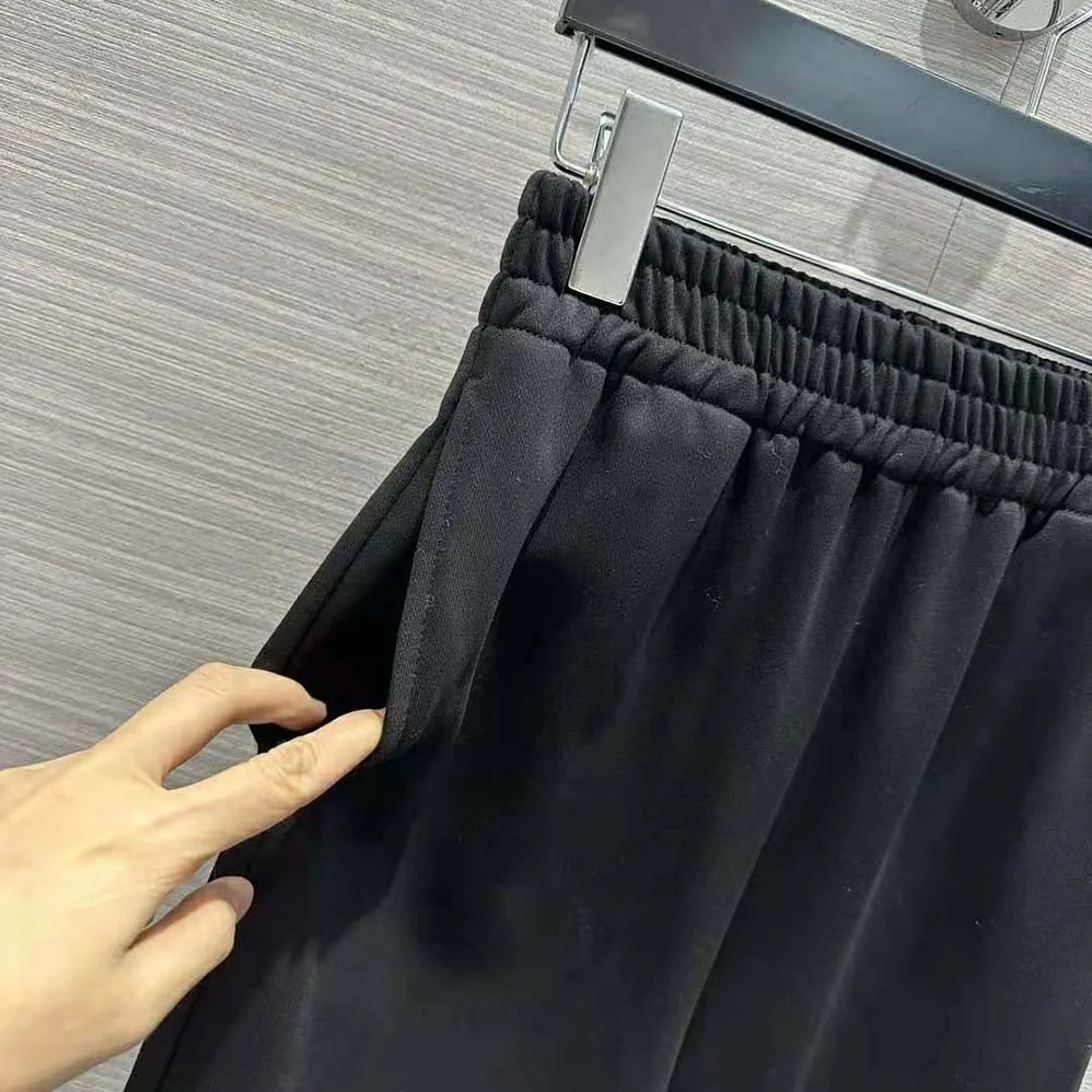 Prada Cotton Fleece Joggers with Feather Trim for Women in Black Prada Cotton Fleece Joggers with Feather Trim for Women in Black