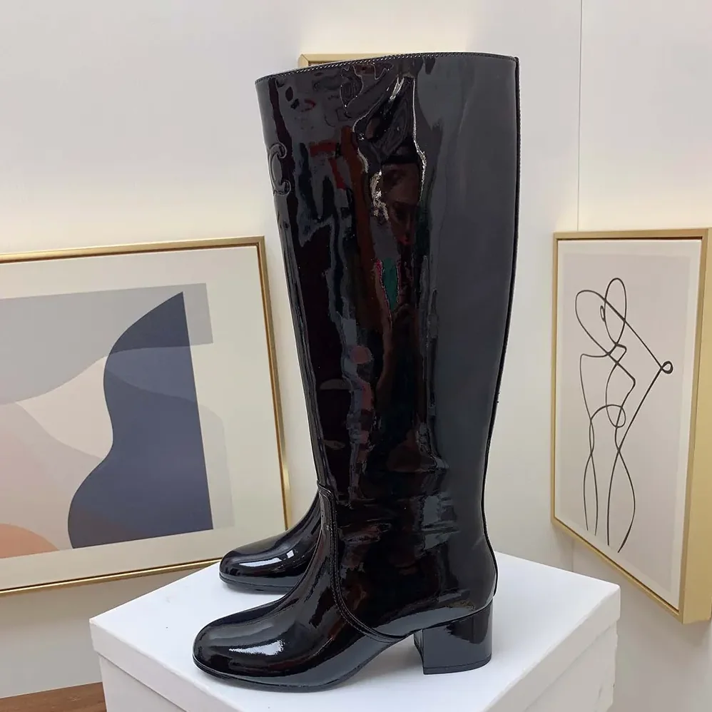 Celine Les Bottes Celine Triomphe High Boot in Patent Calfskin for Women in Black