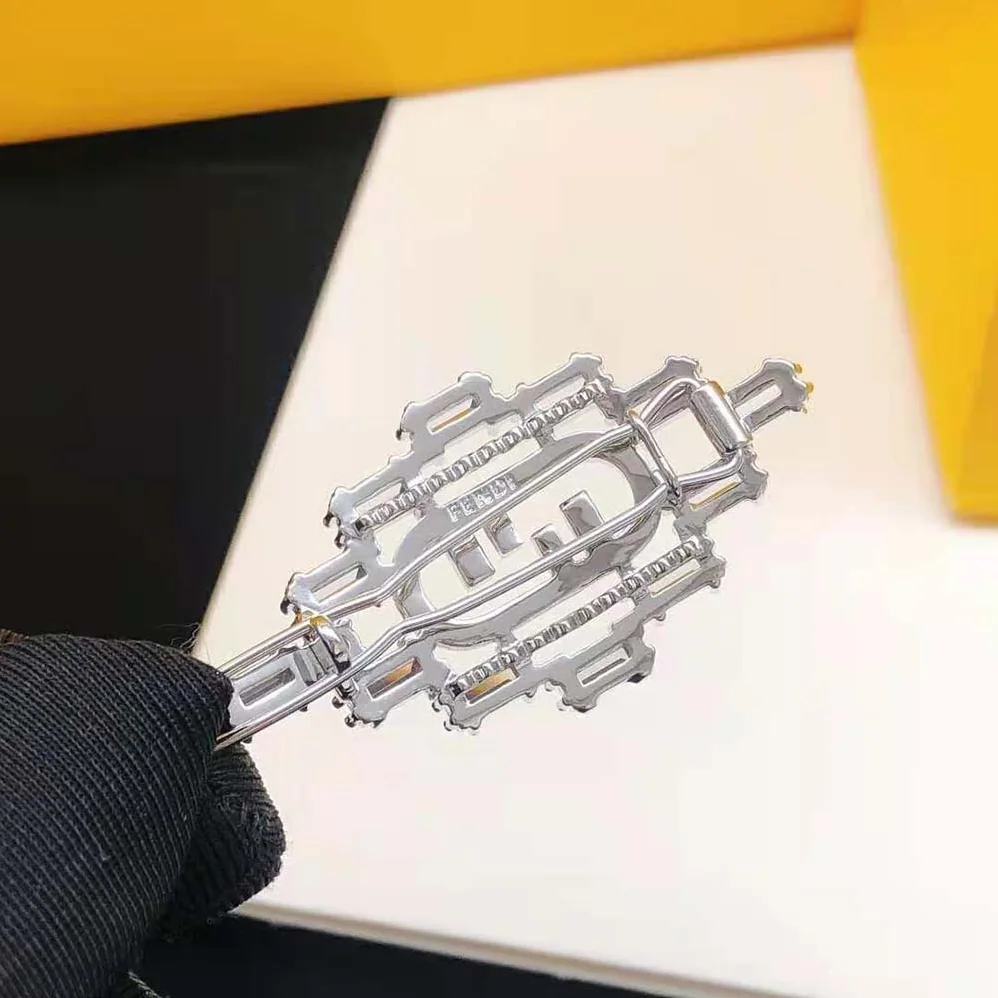 Fendi O'Lock Brooch Silver Coloured for Women