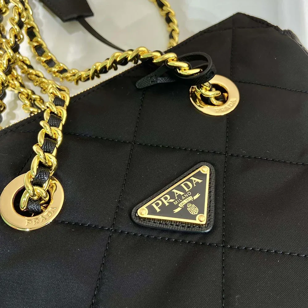 Prada Re-Edition 1995 Chaîne Re-Nylon Tote Bag for Women in Black Prada Re-Edition 1995 Chaîne Re-Nylon Tote Bag for Women in Black