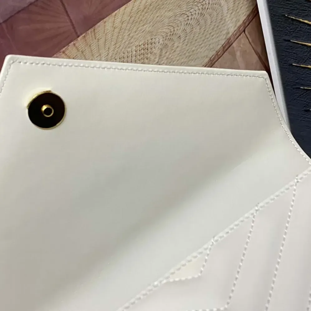 Saint Laurent YSL College Medium in Quilted Leather for Women in White