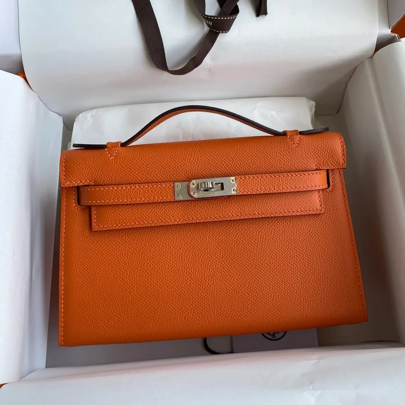 Hermes Kelly Pochette Top Handle Bag in Orange Epsom Palladium Hardware