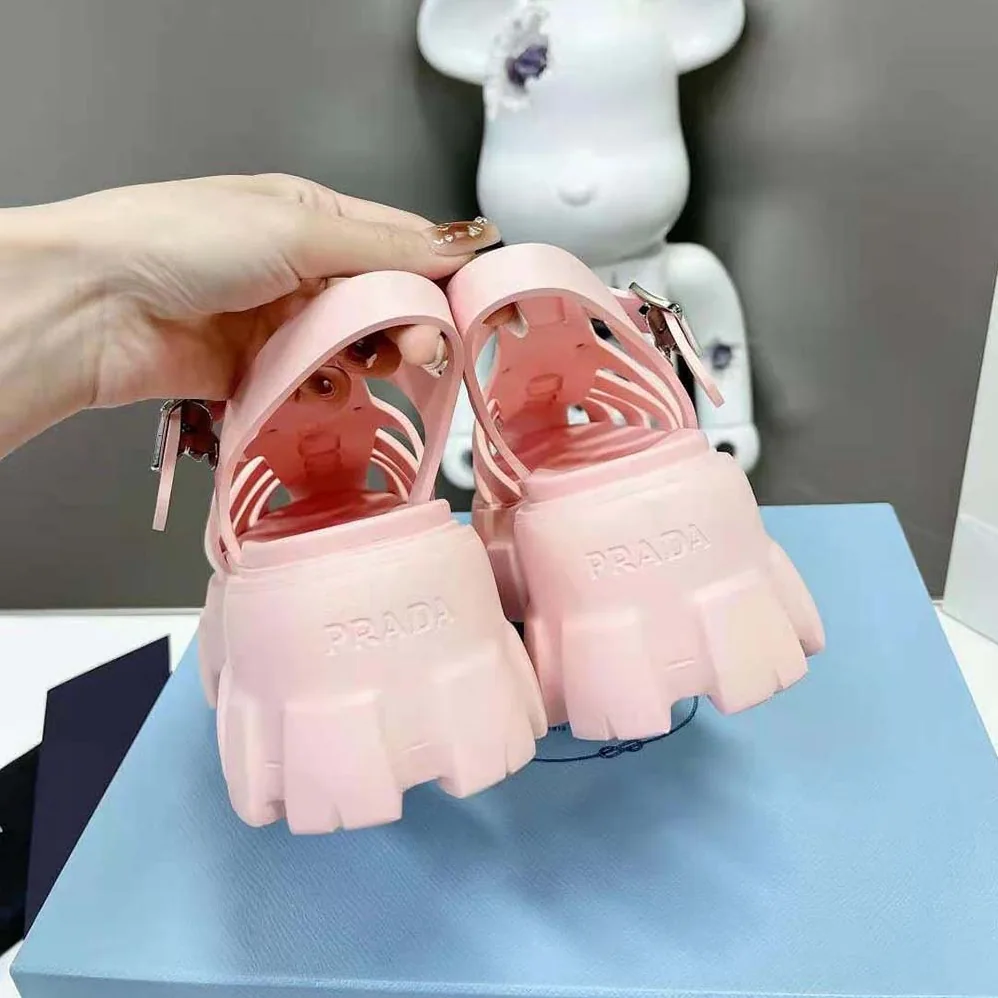Prada Foam Rubber Sandals with Enameled Metal Triangle Logo for Women in Pink
