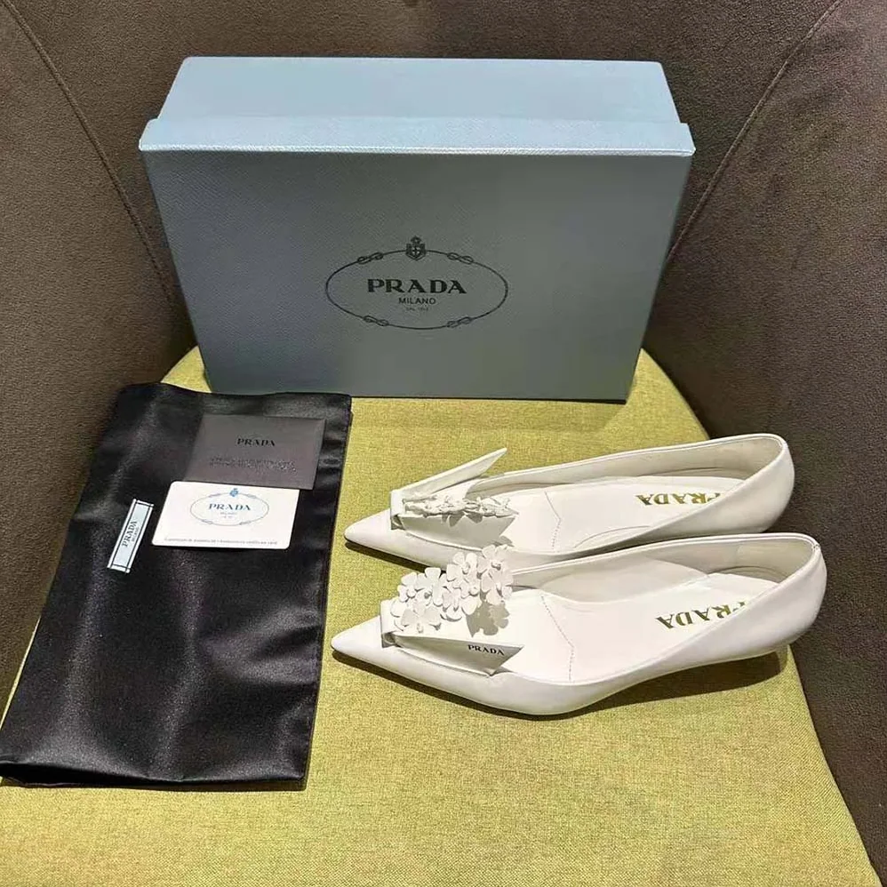 Prada Brushed Leather Pumps with Floral Appliqués for Women in White