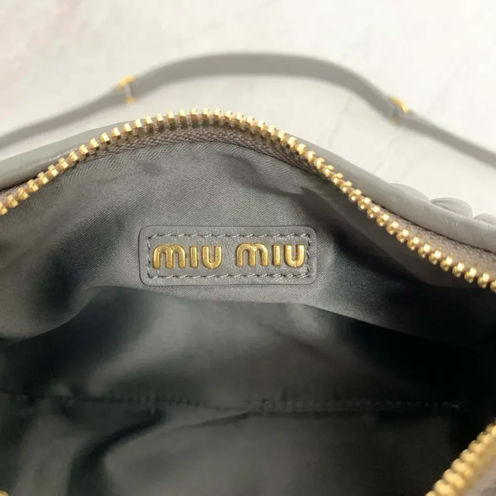 Miu Miu Wander matelassé nappa leather bag for Women in Gray/White Miu Miu Wander matelassé nappa leather bag for Women in Gray/White