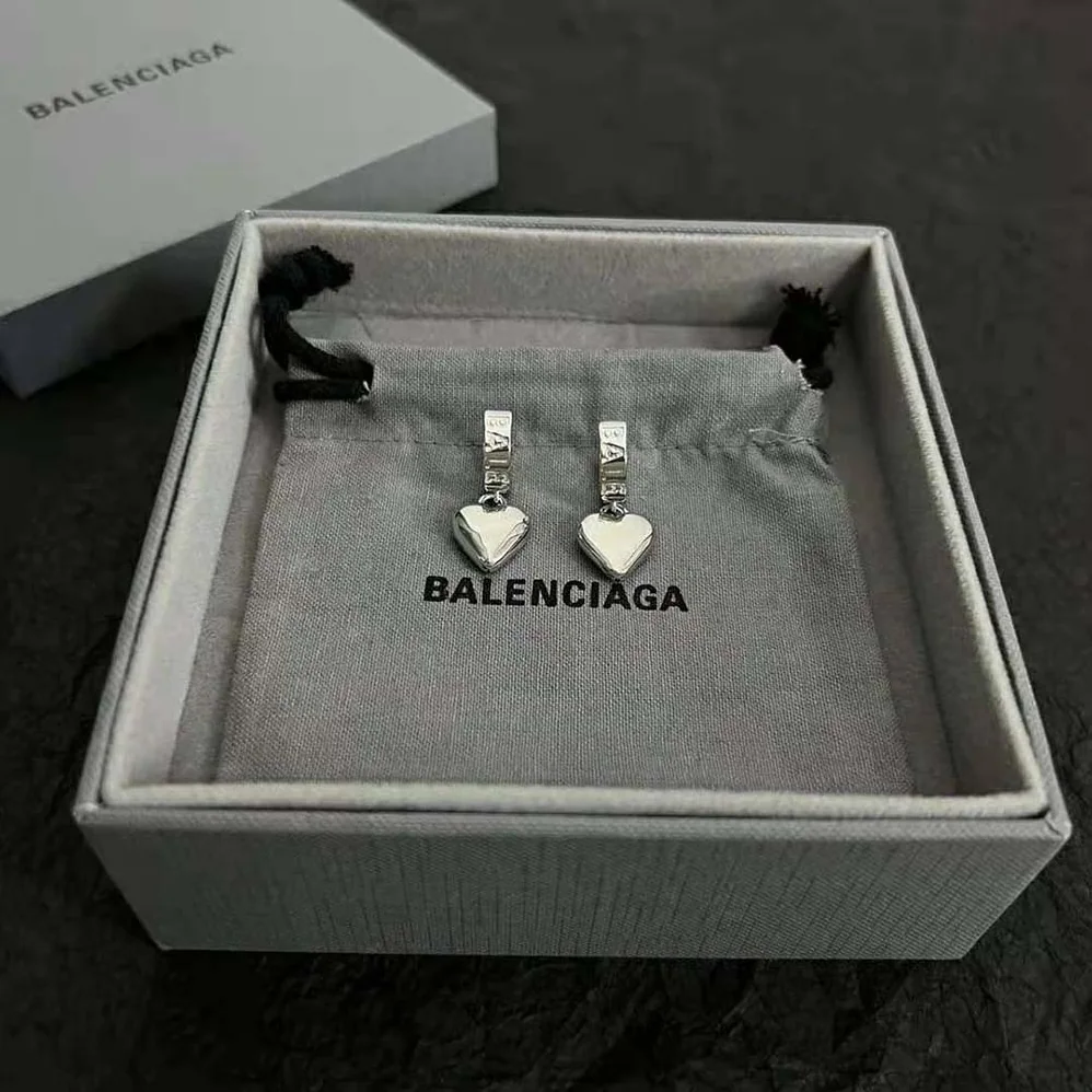Balenciaga Sharp Heart Earrings in Silver for Women