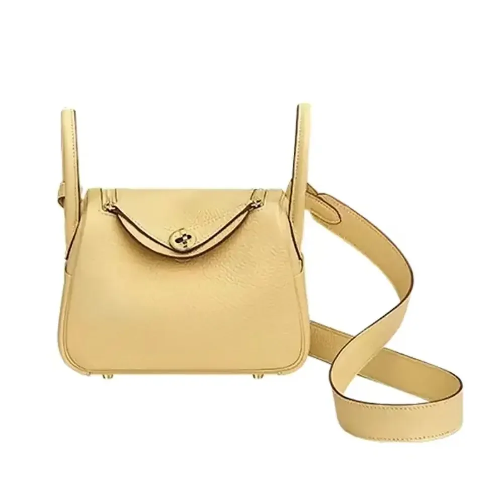 Hermes Lindy Mini 19 in Clemence Leather for Women in Yellow/Gold Hermes Lindy Mini 19 in Clemence Leather for Women in Yellow/Gold