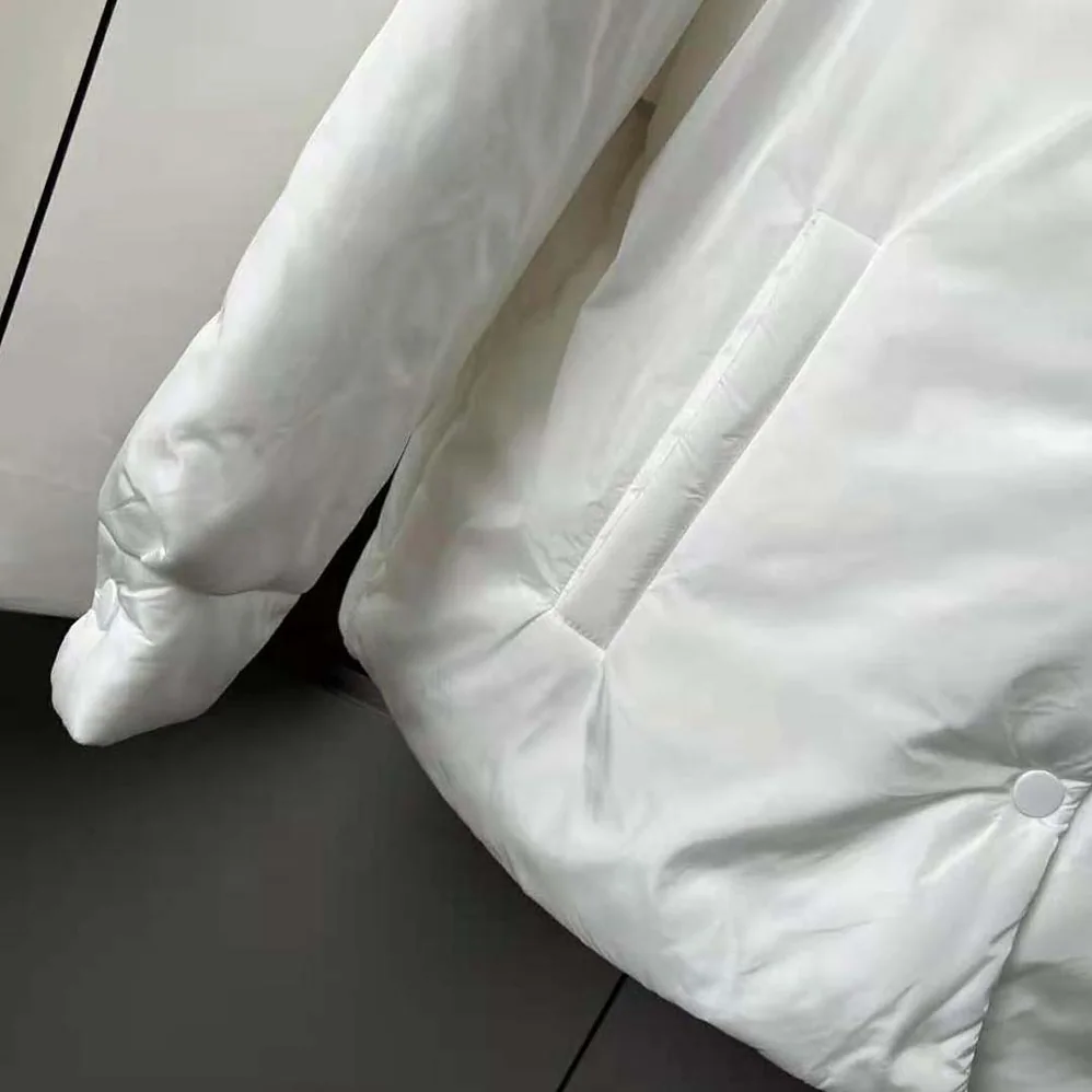 Prada Light Re-Nylon Padded Jacket for Women in White Prada Light Re-Nylon Padded Jacket for Women in White