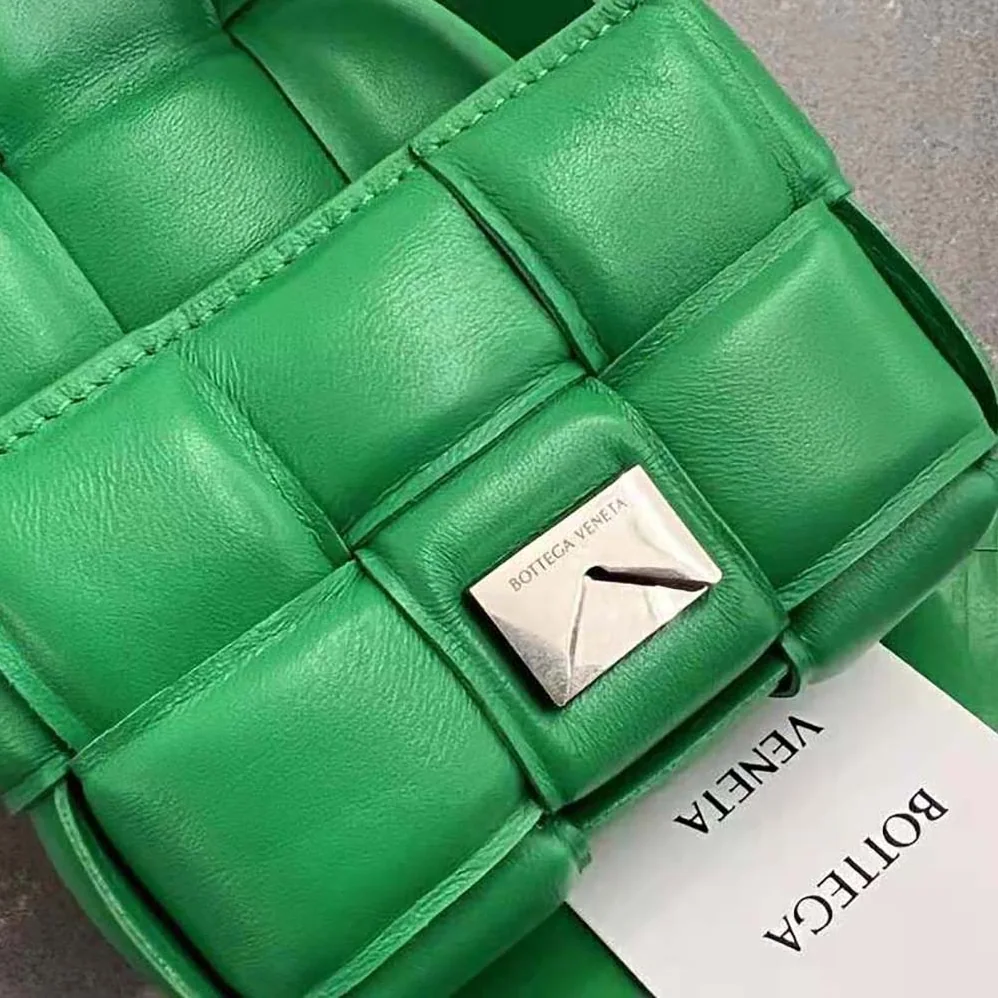 Bottega Veneta Candy Padded Cassette Mini Padded Intreccio Leather Cross-Body Bag for Women in Green Bottega Veneta Candy Padded Cassette Mini Padded Intreccio Leather Cross-Body Bag for Women in Green