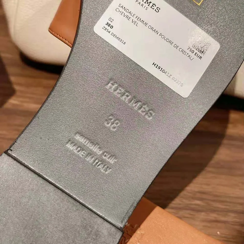 Hermes Giulia Sandal in Calfskin with Iconic Palladium-Plated Kelly Buckle for Women in Brown Hermes Giulia Sandal in Calfskin with Iconic Palladium-Plated Kelly Buckle for Women in Brown