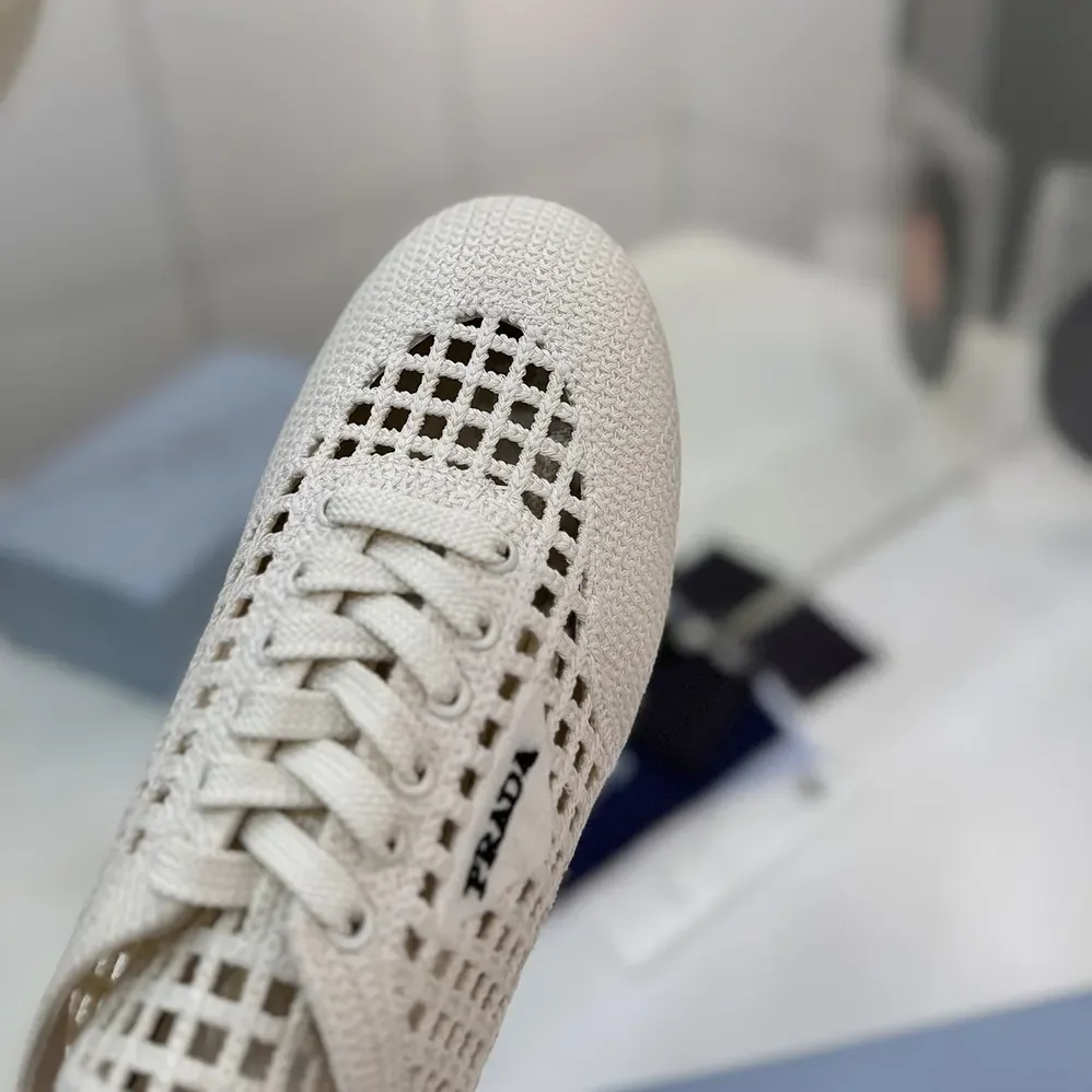 Prada Collapse Crochet Laced Sneakers for Unisex in White Prada Collapse Crochet Laced Sneakers for Unisex in White