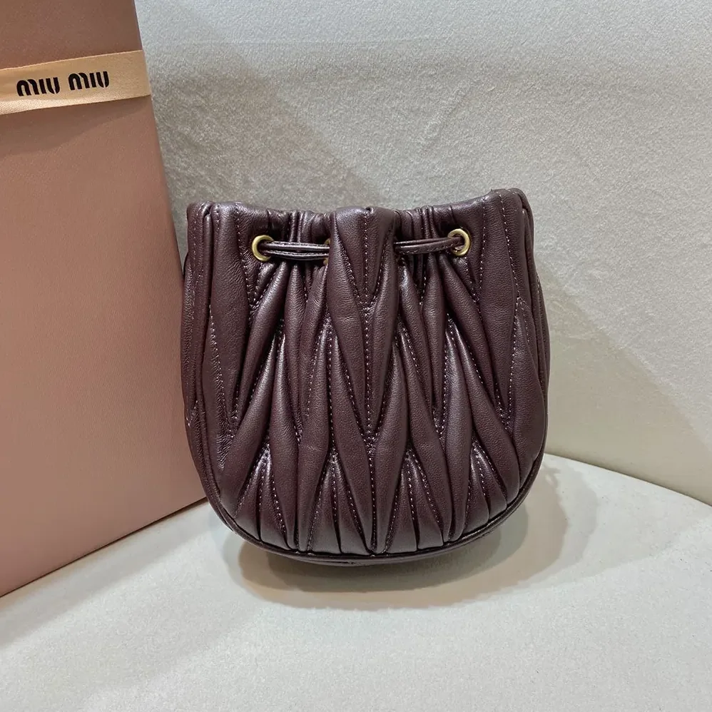 Miu Miu Matelassé Nappa Leather Pouch for Women in Burgundy Miu Miu Matelassé Nappa Leather Pouch for Women in Burgundy