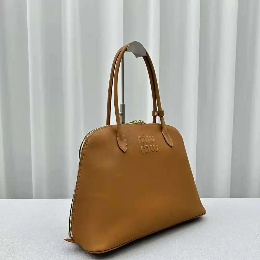 Miu Miu Leather Bag with Embossed Lettering Logo for Women in Brown Miu Miu Leather Bag with Embossed Lettering Logo for Women in Brown