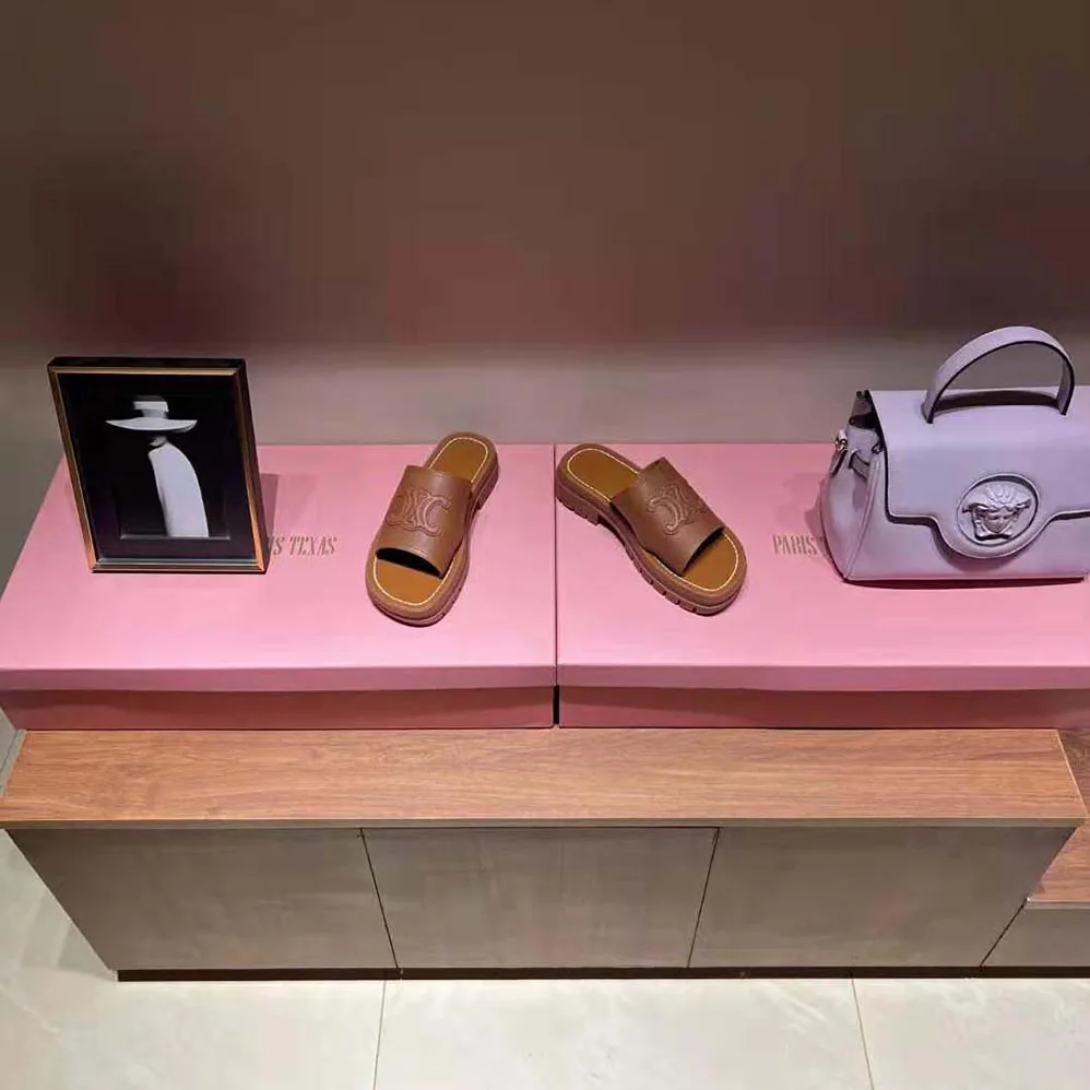 Celine Clea Triomphe Slide in Calfskin & Vegetal Tanning for Women Celine Clea Triomphe Slide in Calfskin & Vegetal Tanning for Women