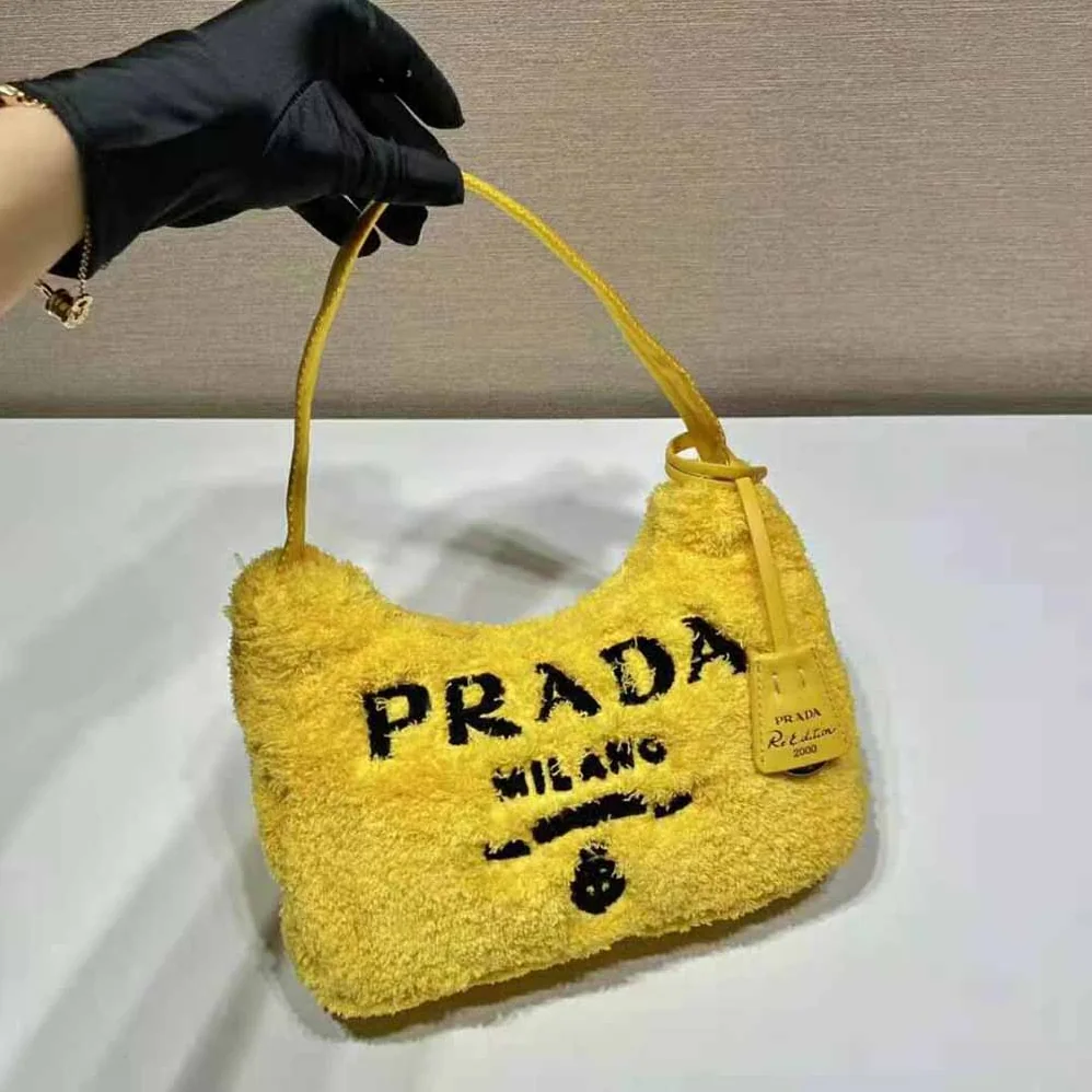 Prada Re-Edition 2000 Terry Mini-Bag for Women in Yellow Prada Re-Edition 2000 Terry Mini-Bag for Women in Yellow