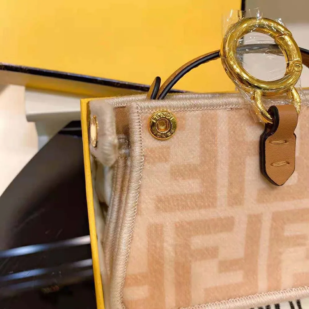 Fendi Nano Peekaboo Charm Beige Wool Charm for Women in Pink Fendi Nano Peekaboo Charm Beige Wool Charm for Women in Pink