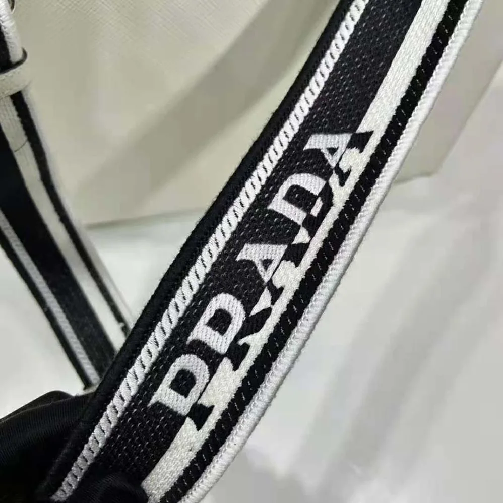 Prada Saffiano Leather Tote Bag with Sleek for Women in White Prada Saffiano Leather Tote Bag with Sleek for Women in White