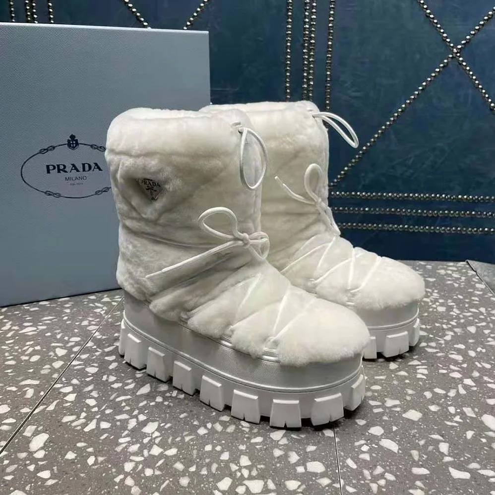 Prada Shearling Apres-ski Boots for Women in White