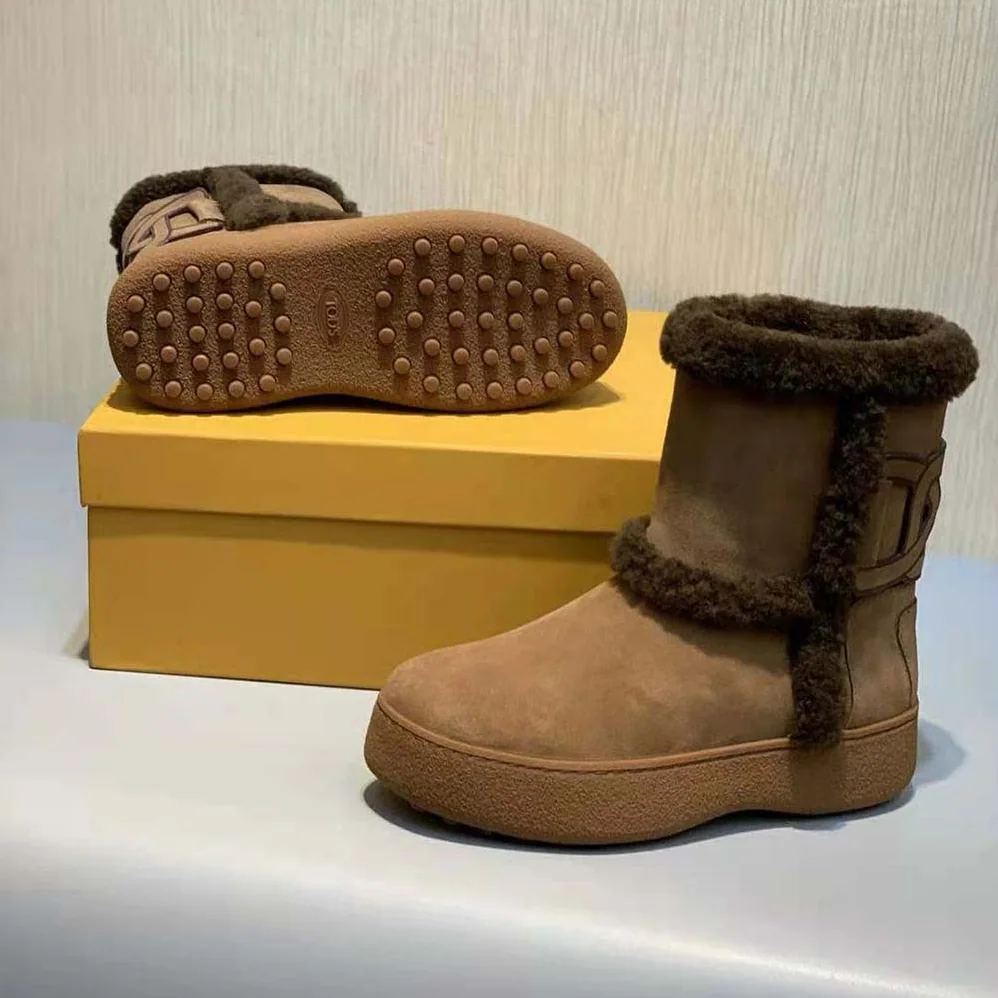 TODS Tod's W. G. Ankle Boots in Suede for Unisex in Brown