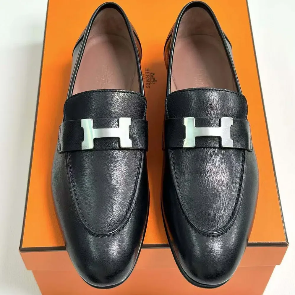 Hermes Loafer in Calfskin with Palladium Plated Signature “H” Detail for Men in Black Hermes Loafer in Calfskin with Palladium Plated Signature “H” Detail for Men in Black