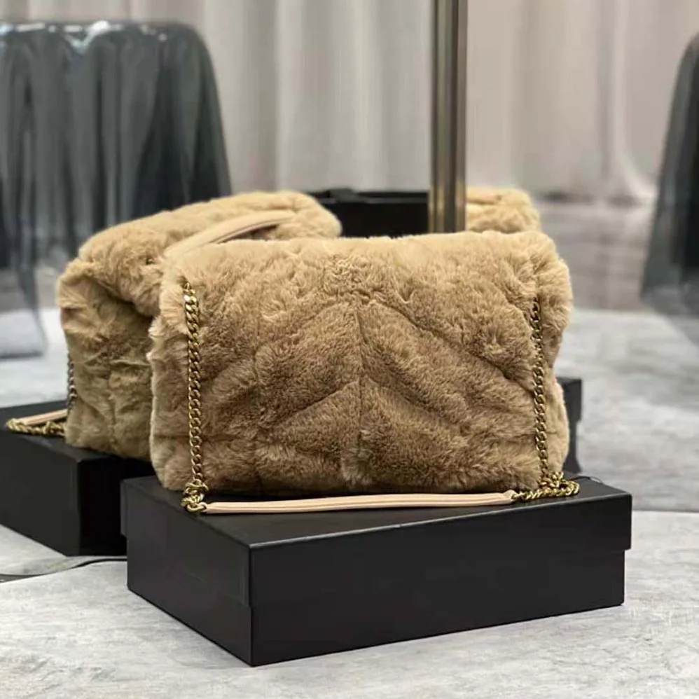 Saint Laurent YSL Puffer Small Bag in Merino Shearling and Lambskin for Women in Sandy Saint Laurent YSL Puffer Small Bag in Merino Shearling and Lambskin for Women in Sandy