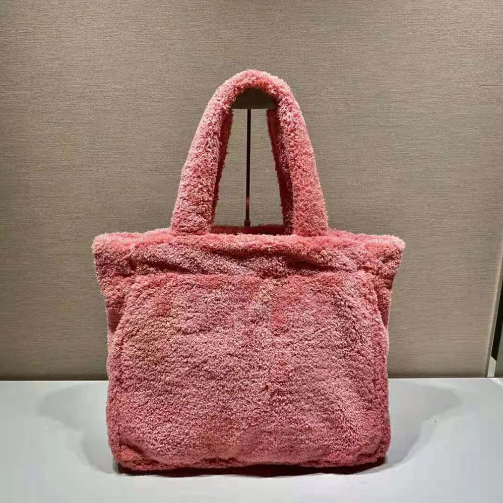 Prada Enameled Metal Triangle Logo Terry Tote Bag for Women in Pink Prada Enameled Metal Triangle Logo Terry Tote Bag for Women in Pink