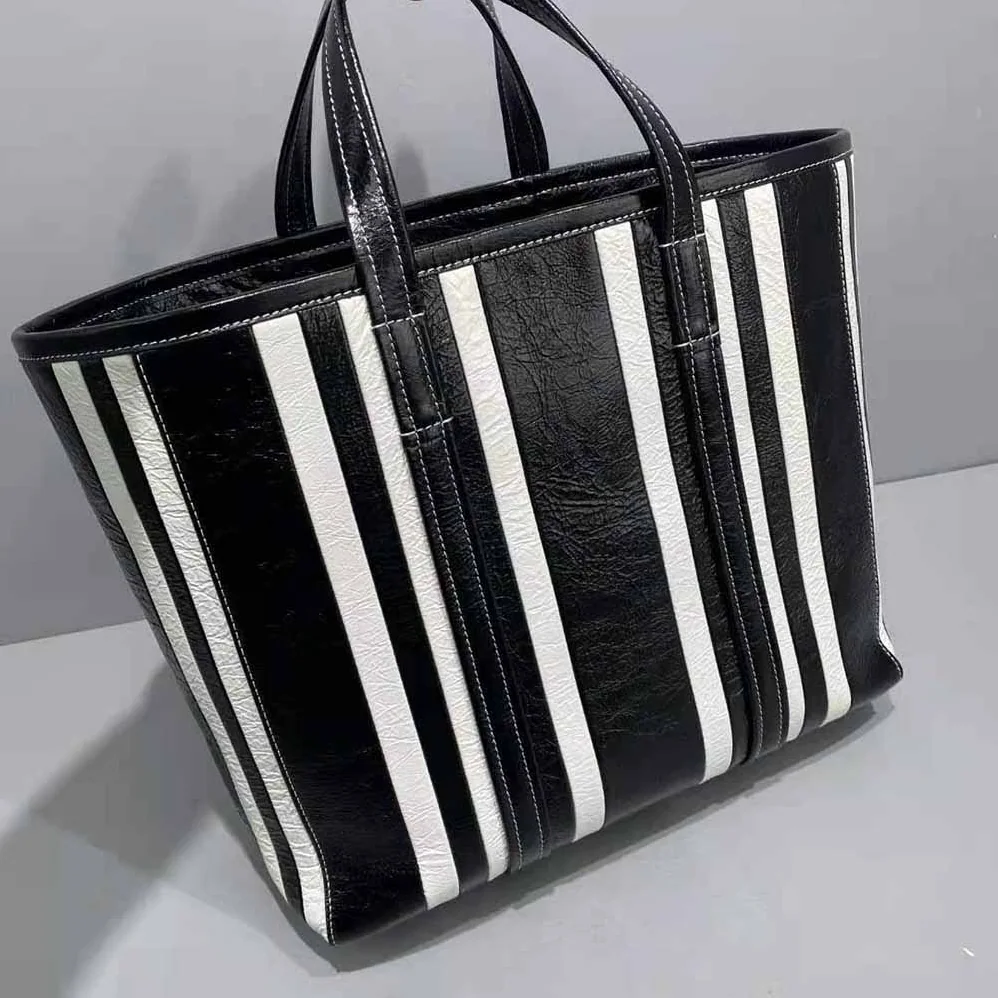 Balenciaga Barbes Medium East-West Shopper Bag for Women in Black Balenciaga Barbes Medium East-West Shopper Bag for Women in Black