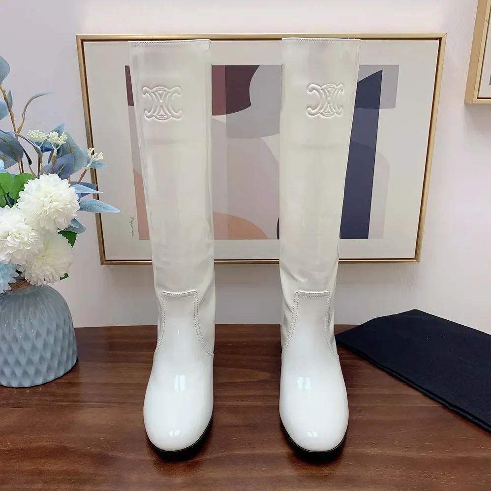 Celine Les Bottes Celine Triomphe High Boot in Patent Calfskin for Women in White