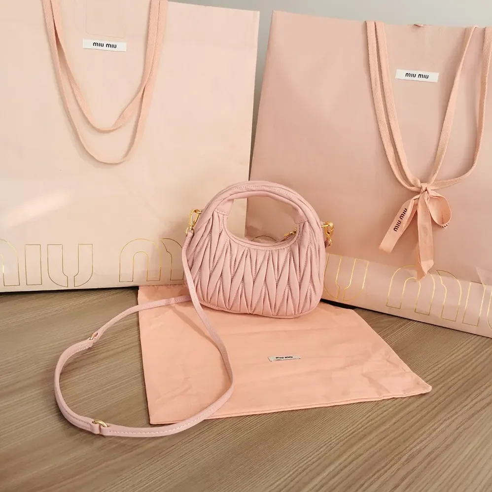 Miu Miu Wander Matelassé Nappa Leather Hobo Mini-Bag for Women in Powder Pink