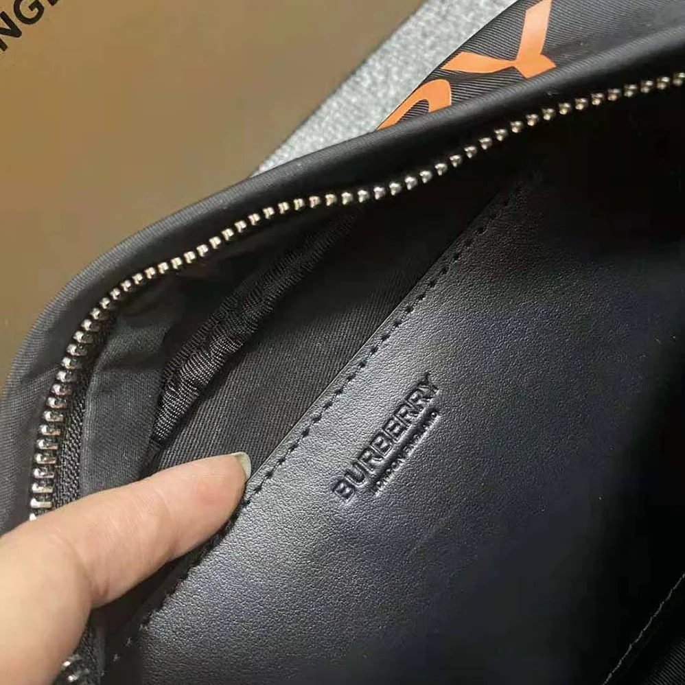 Burberry Coordinates Print Nylon Crossbody Bag for Men in Orange