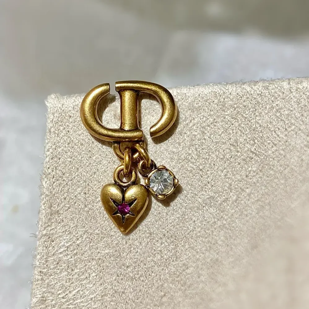 Dior Tribales Earrings Antique Gold for Women in Finish Metal Dior Tribales Earrings Antique Gold for Women in Finish Metal
