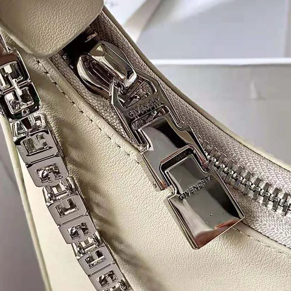 Givenchy Medium Moon Cut Out Bag in Leather for Women in Beige