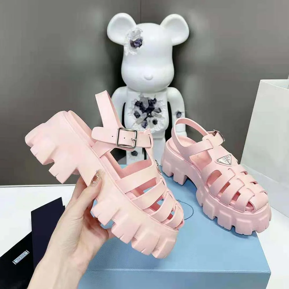 Prada Foam Rubber Sandals with Enameled Metal Triangle Logo for Women in Pink