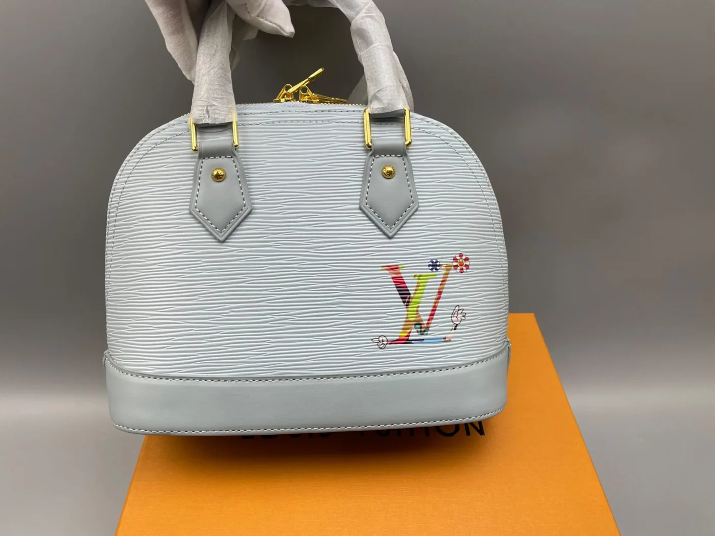 Louis Vuitton LV x TM Alma BB Top Handle Bag in Washed Blue Gold Hardware