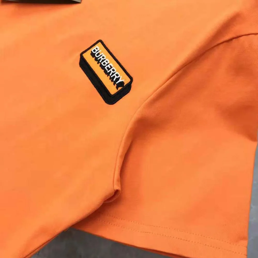 Burberry Logo Appliqué Cotton Oversized T-shirt for Women in Orange Burberry Logo Appliqué Cotton Oversized T-shirt for Women in Orange