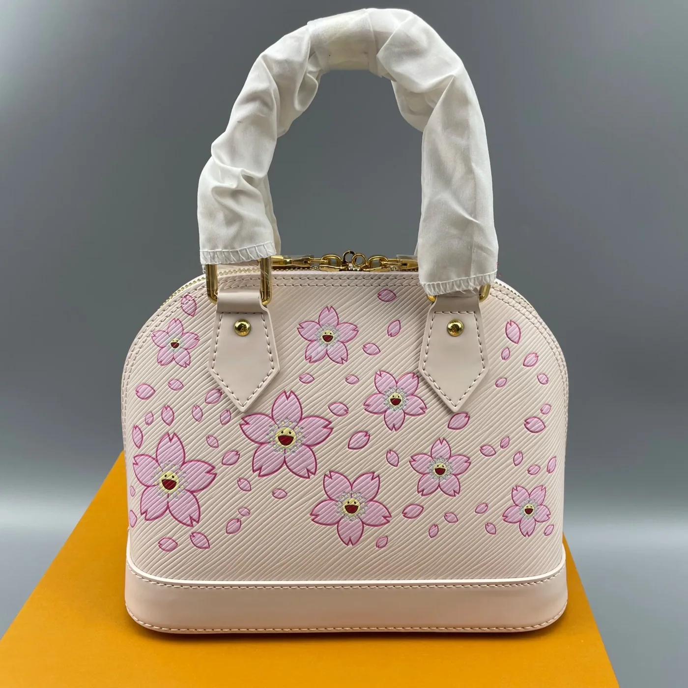 Louis Vuitton LV x TM Alma BB Top Handle Bag in Pink Gold Hardware