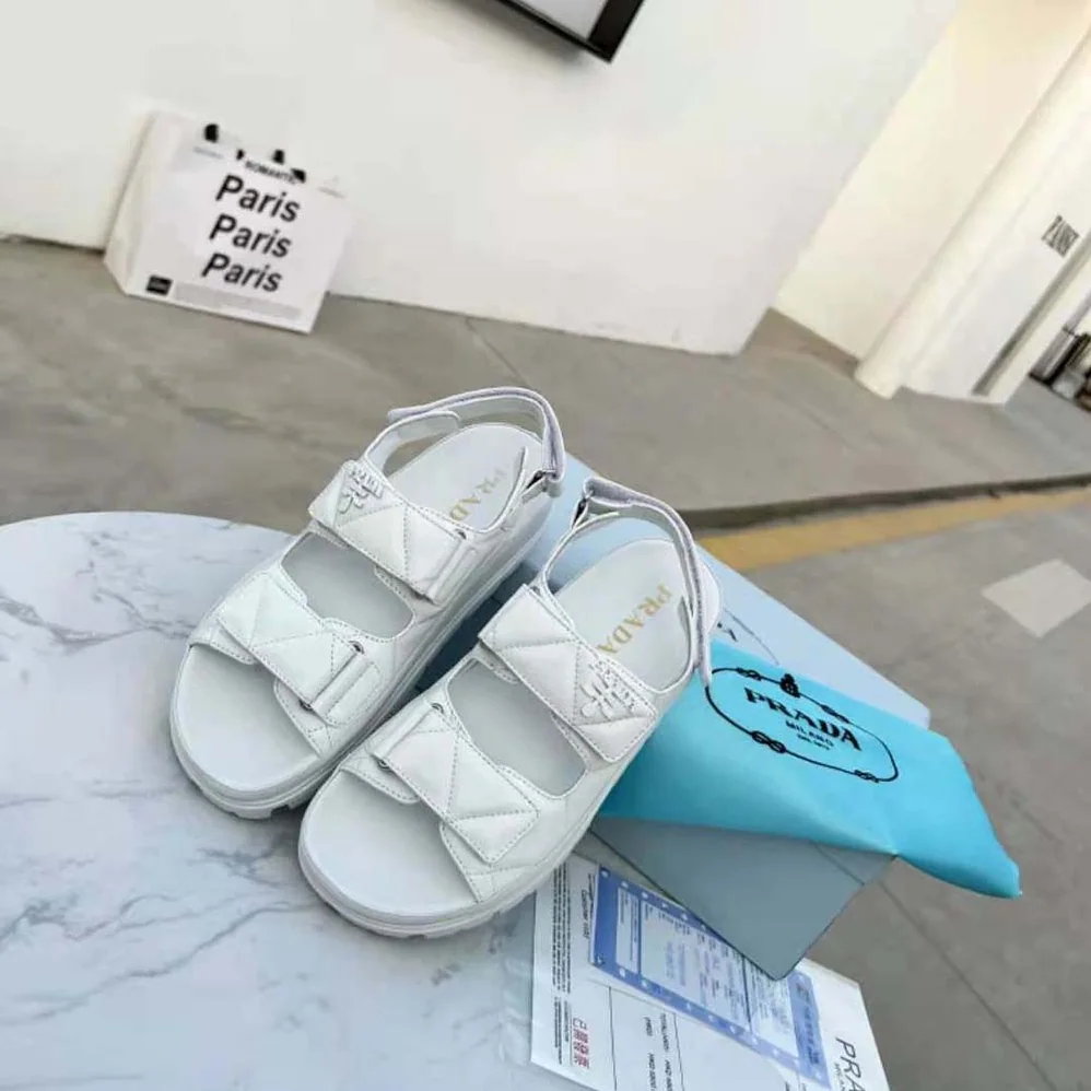Prada Padded Nappa Leather Sandals for Women in White