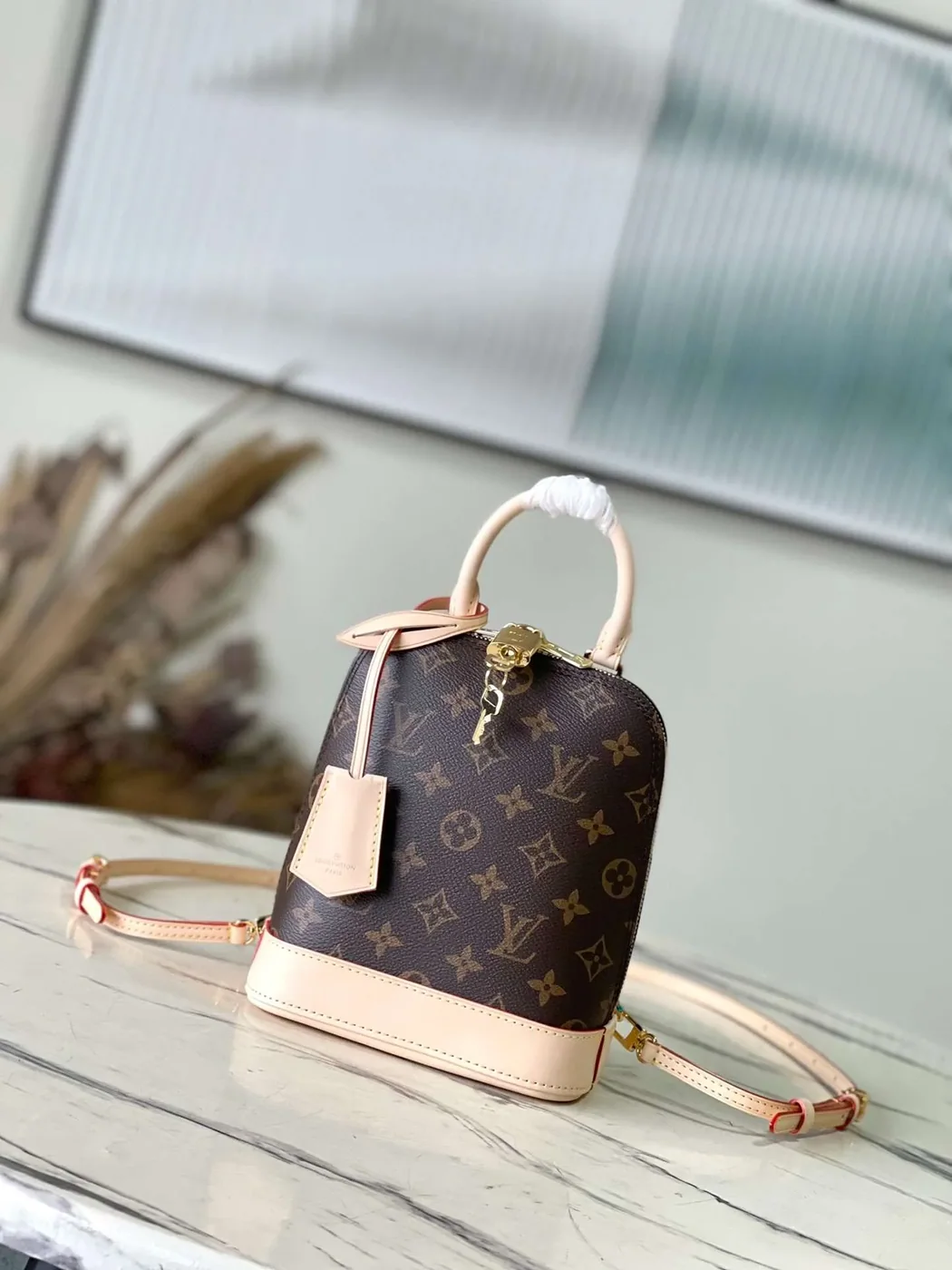 Louis Vuitton Alma Top Handle Bag in Brown Gold Hardware Louis Vuitton Alma Top Handle Bag in Brown Gold Hardware