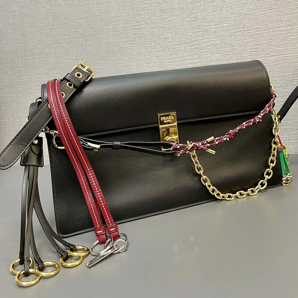 Prada Soft Sound Large Leather Shoulder Bag with Charms for Women in Black