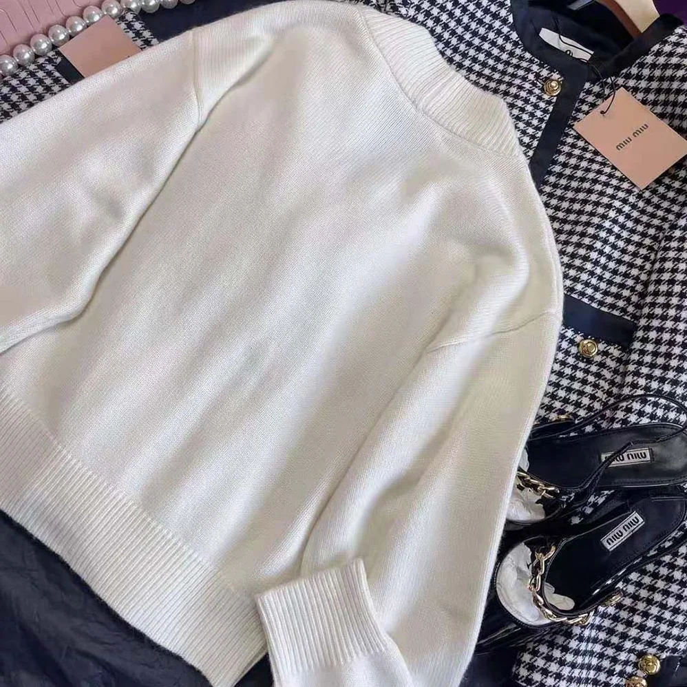 Miu Miu Cashmere Cardigan Features an Embroidered Logo for Women in White Miu Miu Cashmere Cardigan Features an Embroidered Logo for Women in White